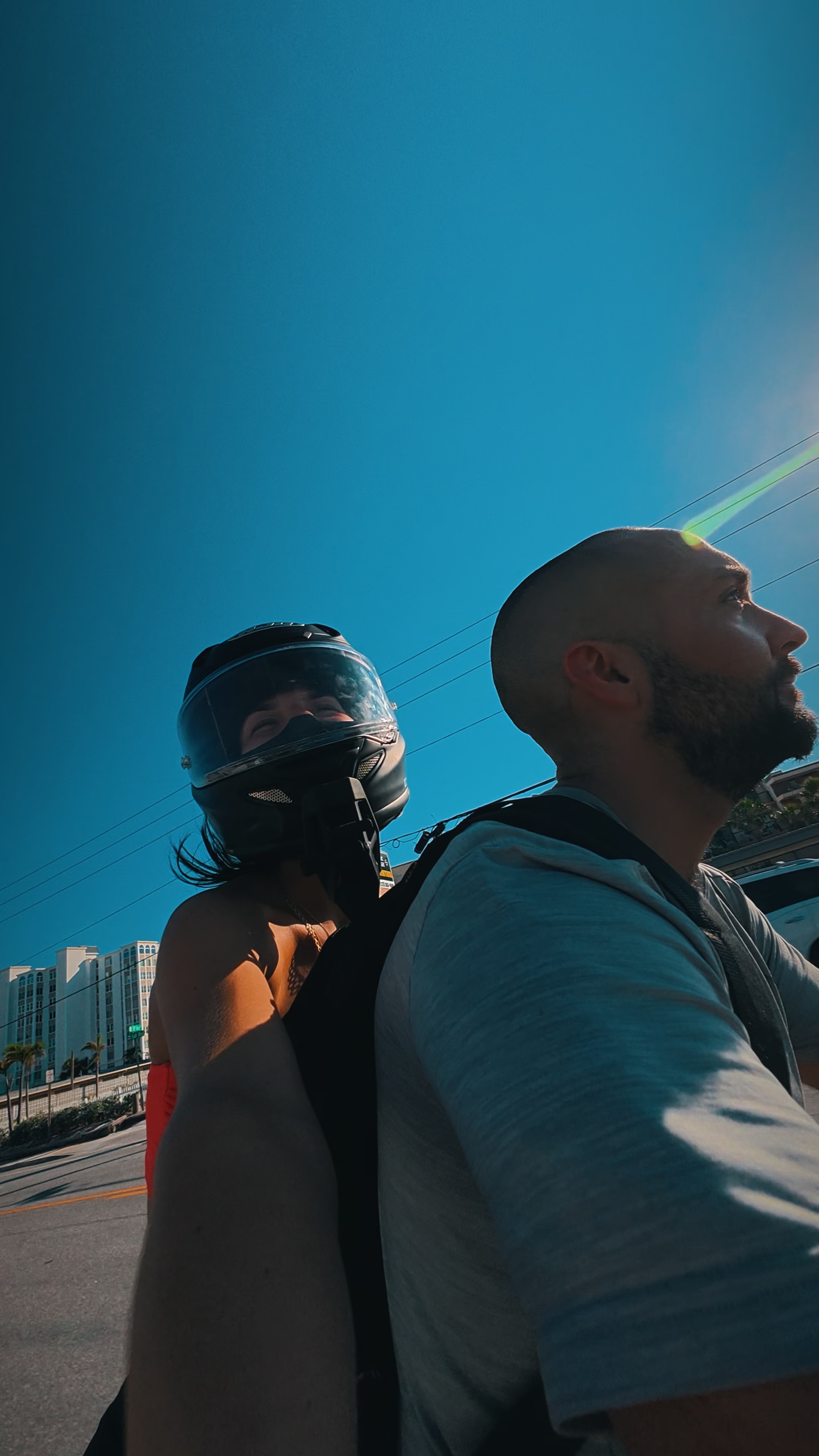 Ryan Chang riding on a motorcycle.